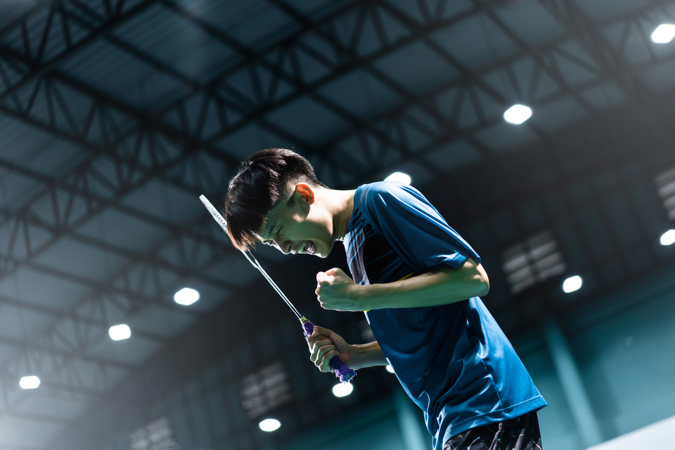 Asian badminton player is glad he scored